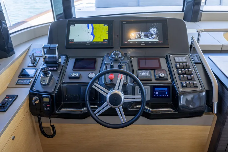 Slide: The Image of Cockpit of 2019 Sirena 64 yacht with advanced navigation and control systems. - 39