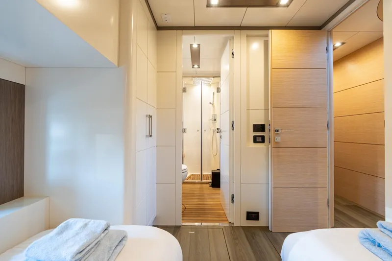 Slide: The Image of Luxurious interior of 2019 Sirena 64 yacht featuring modern bathroom and cozy bedroom. - 57