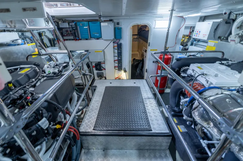 Slide: The Image of Engine room of 2019 Sirena 64 yacht, featuring advanced machinery and equipment. - 95