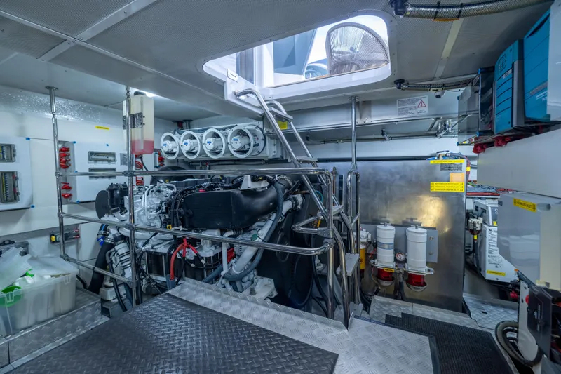 Slide: The Image of Engine room of 2019 Sirena 64 yacht, showcasing machinery and equipment. - 99
