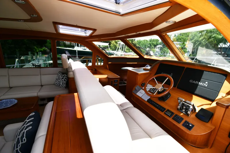 Slide: The Image of Luxurious interior of 2020 Palm Beach Motor Yachts PB52 with modern helm and seating. - 30
