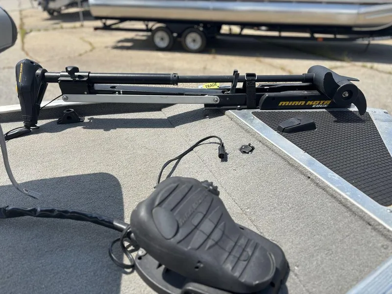 Slide: The Image of 2013 Tracker Pro 160 boat with Minn Kota trolling motor on deck. - 15