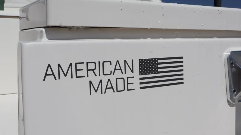 Slide: The Image of "American Made" decal on 2023 Pursuit OS 355 Offshore boat. - 10