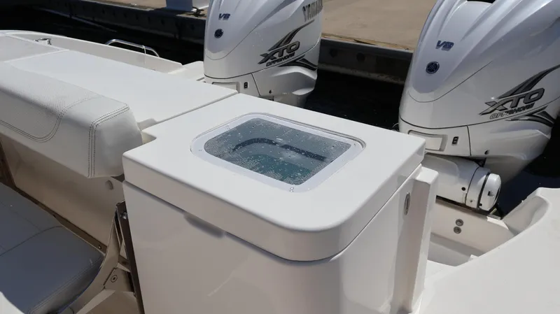 Slide: The Image of 2023 Pursuit OS 355 Offshore boat with dual Yamaha XTO engines and seating area. - 16