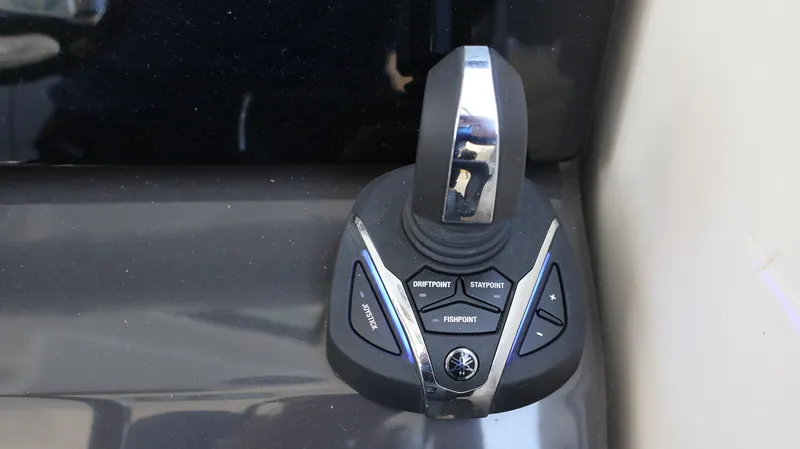 Slide: The Image of Joystick control panel on 2023 Pursuit OS 355 Offshore boat. - 41
