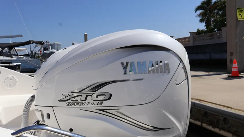 Slide: The Image of 2023 Pursuit OS 355 Offshore with Yamaha XTO Offshore engine at marina. - 8