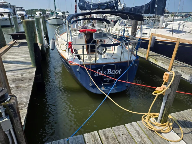 Slide: The Image of Sailboat docked at marina, Tartan 31 model, 1994, named "das Boot." - 2