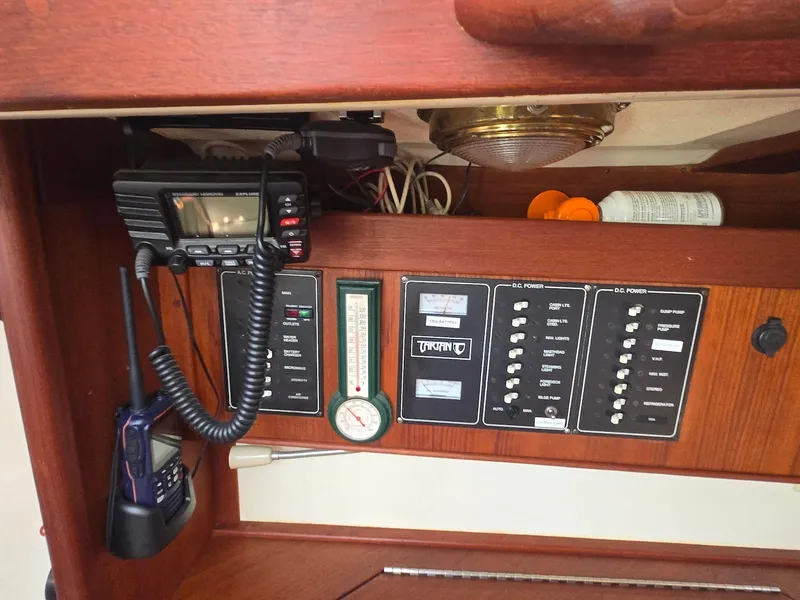 Slide: The Image of Control panel of a 1994 Tartan 31 sailboat with radio and gauges. - 21