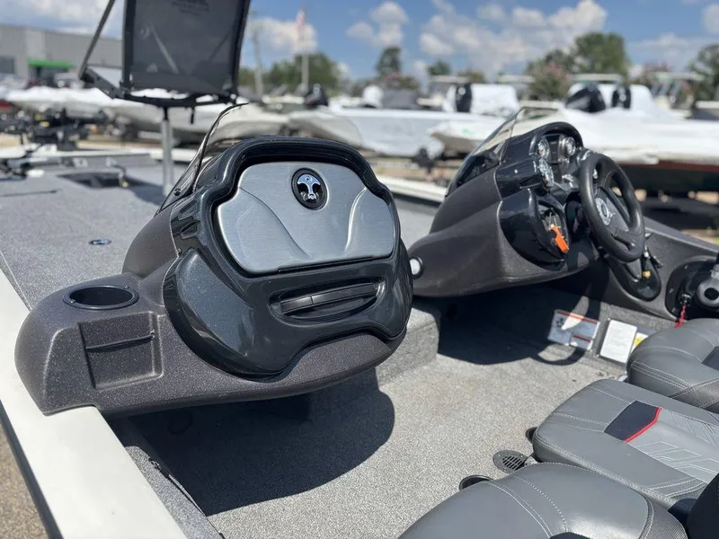 Slide: The Image of 2013 Tracker Pro Team™ 190 TX boat interior with steering console and seating. - 9