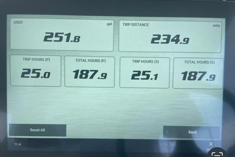 Slide: The Image of Display screen showing fuel usage and trip data for 2022 Regal 33 SAV boat. - 14
