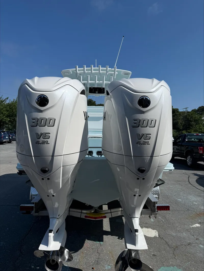 Slide: The Image of Twin 300 V6 outboard engines on a 2025 Orion 29 CC boat. - 6