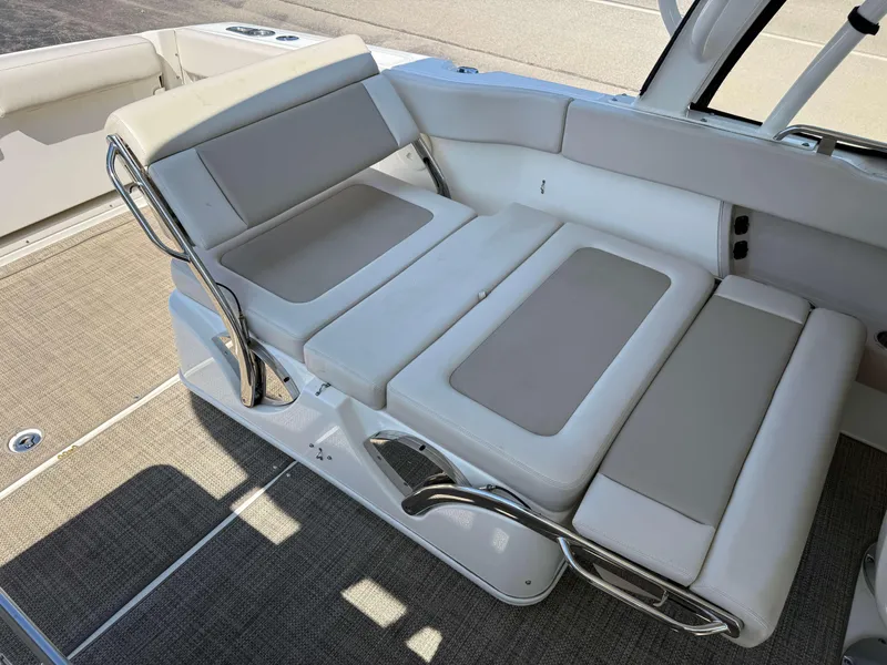 Slide: The Image of 2017 Boston Whaler 320 Vantage boat interior with adjustable seating and sleek design. - 11