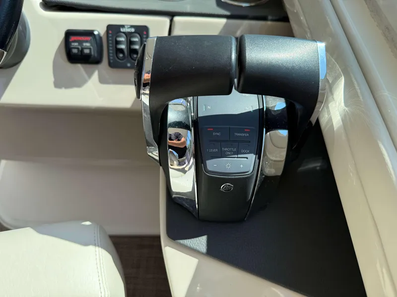 Slide: The Image of Throttle control panel of a 2017 Boston Whaler 320 Vantage boat. - 25