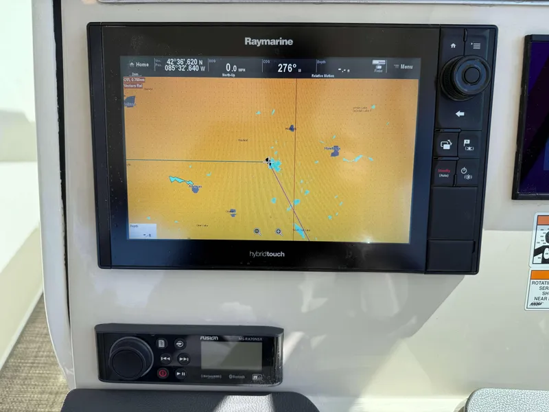 Slide: The Image of Raymarine navigation display on 2017 Boston Whaler 320 Vantage boat dashboard. - 29