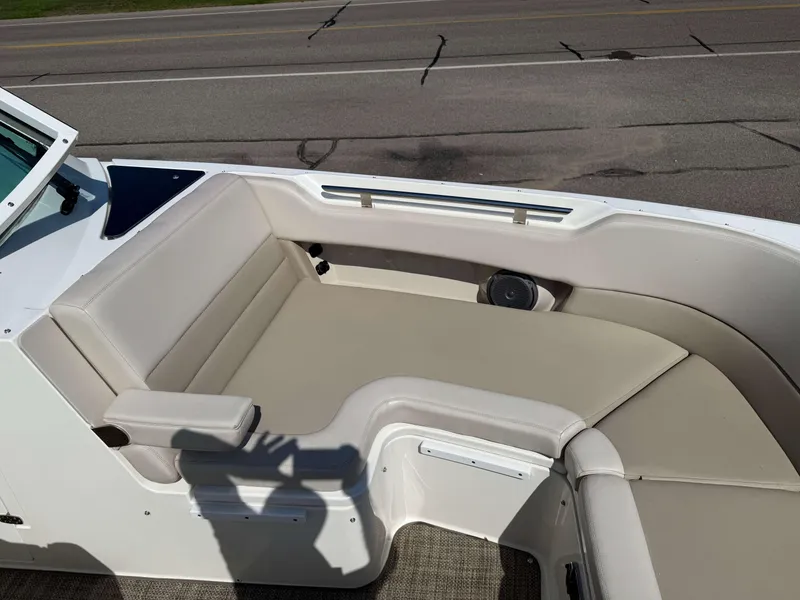 Slide: The Image of 2017 Boston Whaler 320 Vantage boat interior with beige seating and speaker. - 41