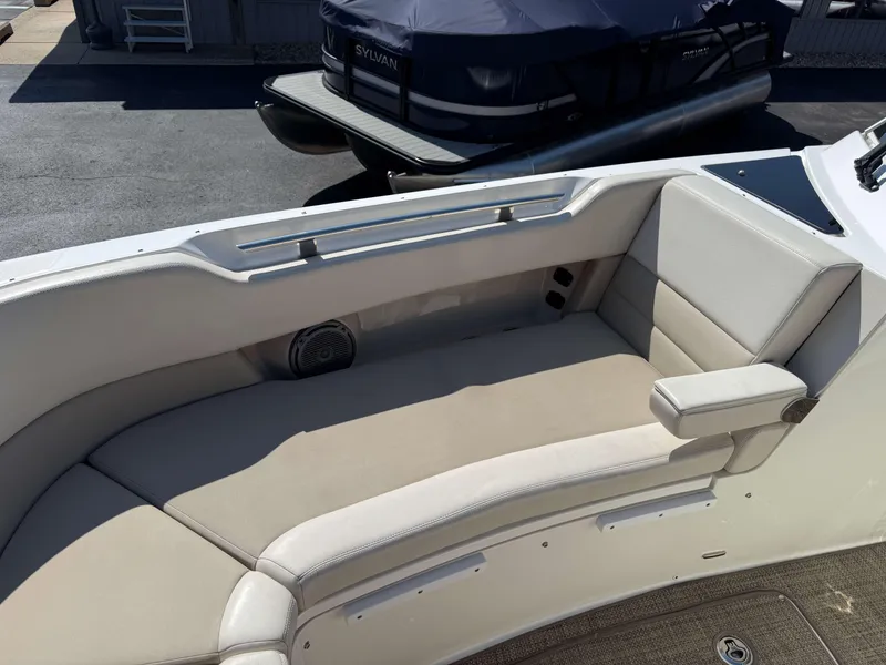 Slide: The Image of 2017 Boston Whaler 320 Vantage boat interior with cushioned seating area. - 42