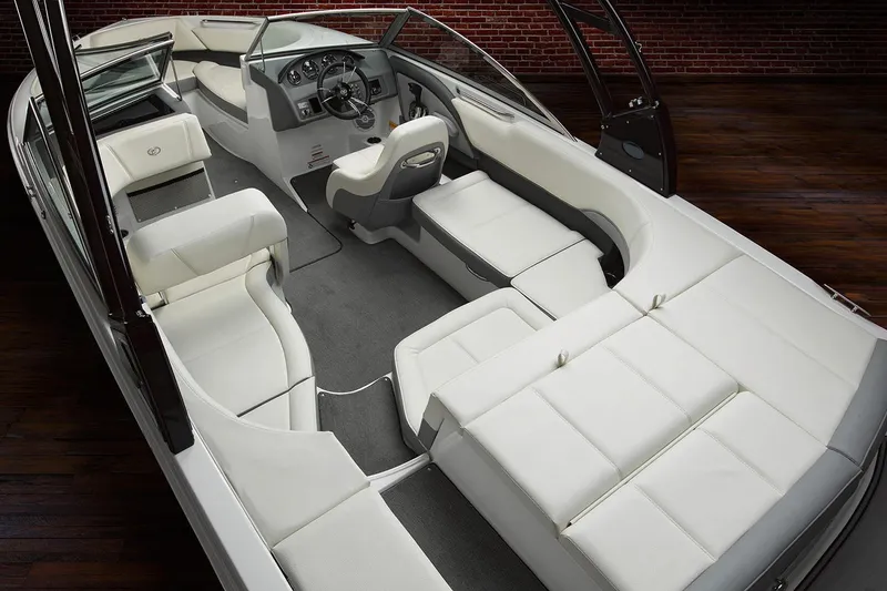 Slide: The Image of Manufacturer Provided Image: 2019 Cobalt 220S boat interior with white leather seating and modern dashboard. - 8