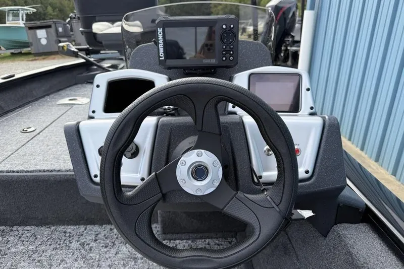 Slide: The Image of Steering console of 2026 Tracker Pro Team 175 Crappie Edition boat with Lowrance display. - 17