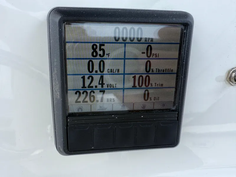 Slide: The Image of Digital display on 2018 Tidewater 232 LXF showing engine metrics and performance data. - 22