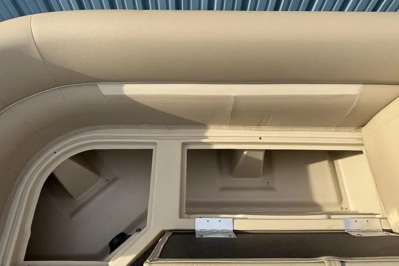 Slide: The Image of Interior seating and storage of 2025 Godfrey Xperience 2286 SBX pontoon boat. - 11