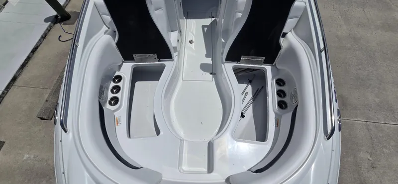 Slide: The Image of 2011 SouthWind 2200 SD boat interior with seating and storage compartments. - 15