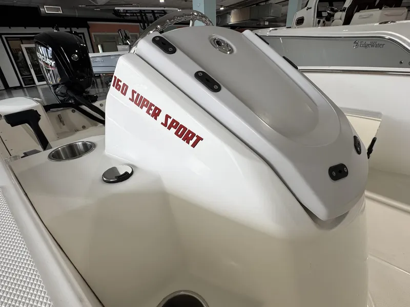 Slide: The Image of 2023 Boston Whaler 160 Super Sport boat interior with sleek design and modern features. - 4