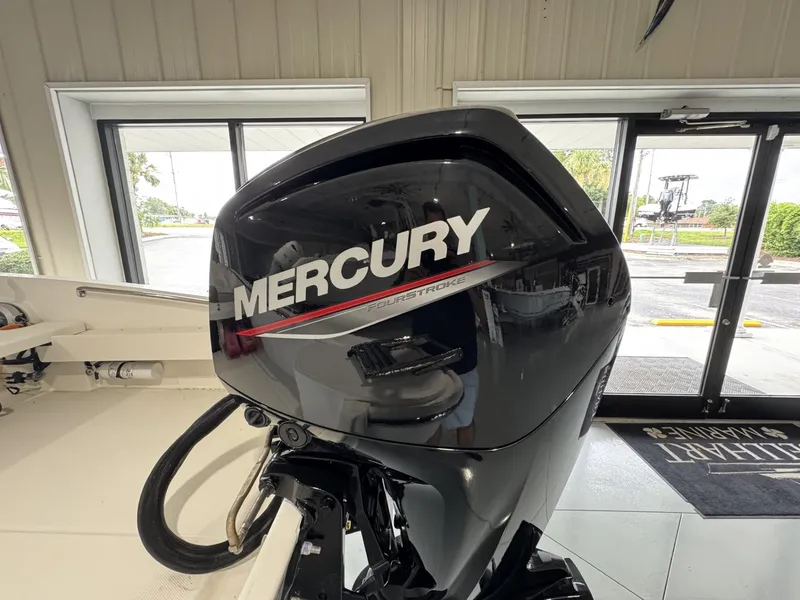 Slide: The Image of Mercury FourStroke engine on 2023 Boston Whaler 160 Super Sport boat. - 7