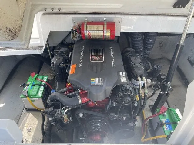 Slide: The Image of Engine compartment of a 2004 Cobalt 226 boat with Volvo Penta engine and batteries. - 12