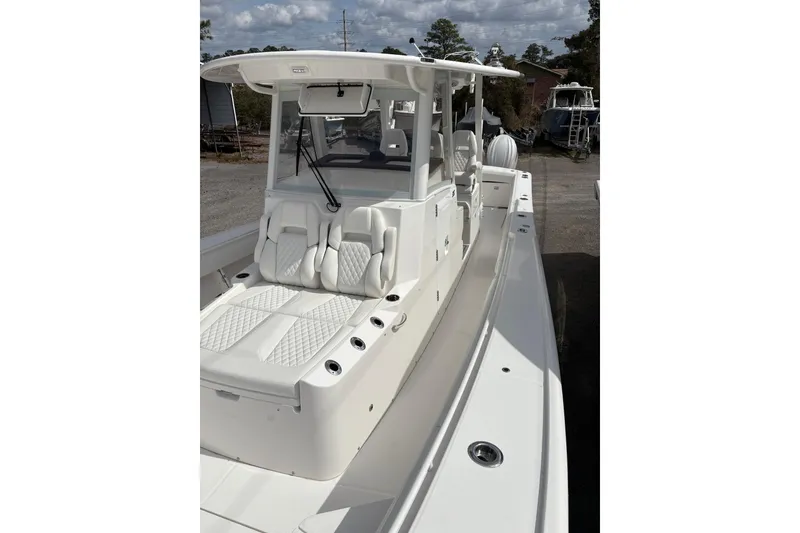 Slide: The Image of 2026 Regulator 35 boat with sleek design and comfortable seating. - 10