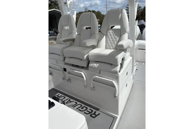 Slide: The Image of 2026 Regulator 35 boat with luxurious white seating and modern design. - 15