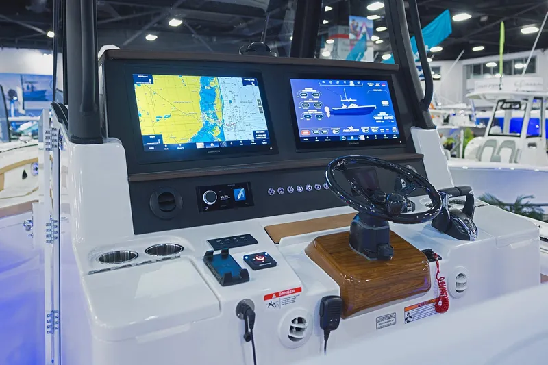 Slide: The Image of 2026 Regulator 35 boat dashboard with advanced navigation screens and controls. - 6