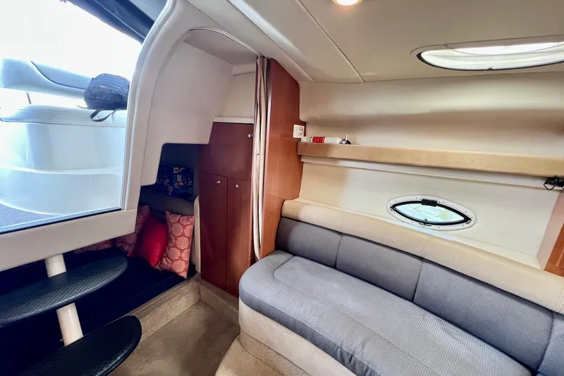 Slide: The Image of Interior of 2006 Maxum 3100 SE boat with cozy seating and modern design. - 17