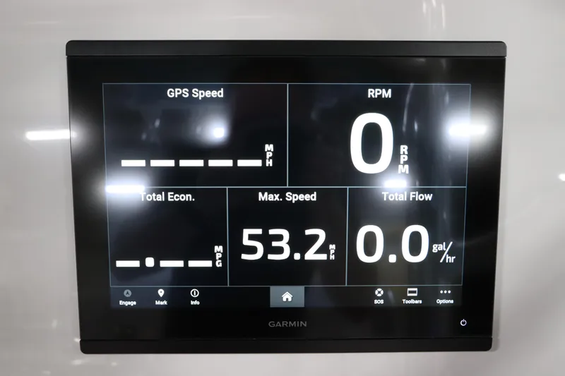 Slide: The Image of Garmin display on 2024 SeaCraft 23CC showing speed, RPM, and fuel flow metrics. - 35