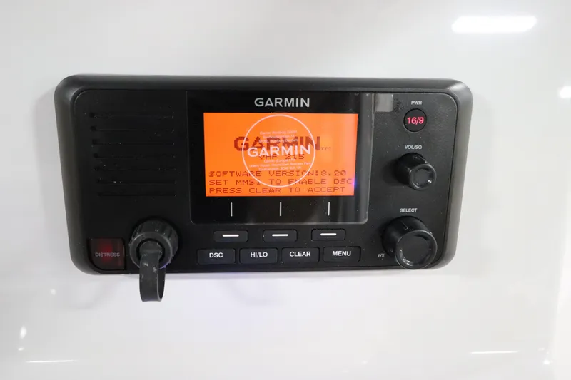 Slide: The Image of Garmin marine radio on 2024 SeaCraft 23CC boat, displaying software update screen. - 37