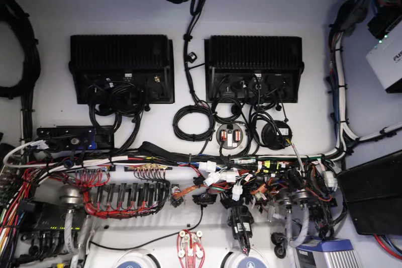 Slide: The Image of Electrical system of a 2024 SeaCraft 23CC boat, showcasing wiring and components. - 46