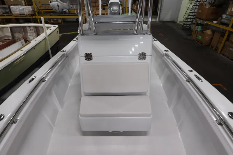 Slide: The Image of 2024 SeaCraft 23CC boat interior with white seating and stainless steel fittings. - 42