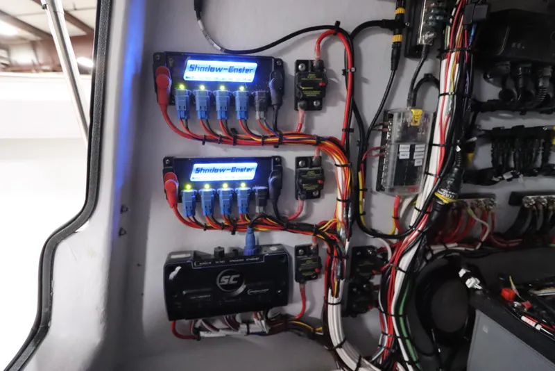 Slide: The Image of Electrical wiring and components inside a 2024 SeaCraft 23CC boat. - 45