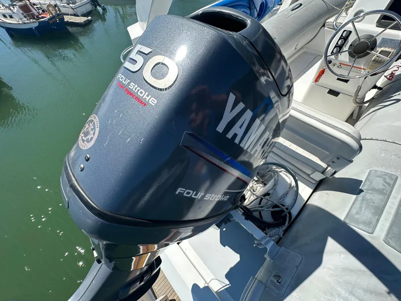 Slide: The Image of Yamaha 50 horsepower four-stroke outboard motor on Ocean Alexander Pilothouse, 1985 model. - 30