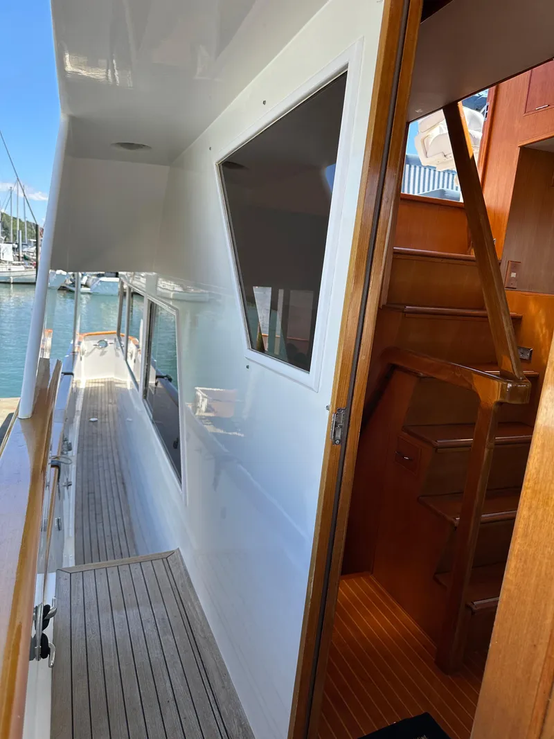 Slide: The Image of 1985 Ocean Alexander Pilothouse yacht with wooden interior and exterior walkway. - 5