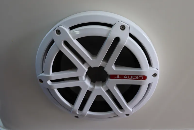 Slide: The Image of White JL Audio speaker on a 2004 Sea Ray 420 Sundancer boat. - 20