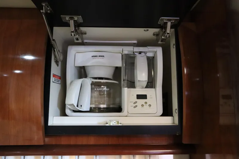 Slide: The Image of Built-in Black & Decker coffee maker in 2004 Sea Ray 420 Sundancer yacht kitchen cabinet. - 33