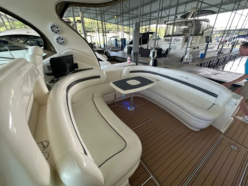 Slide: The Image of Luxurious 2005 Sea Ray 420 Sundancer yacht interior with plush seating and elegant design. - 20