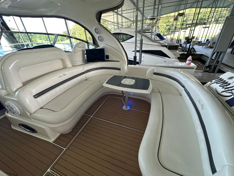 Slide: The Image of Interior of 2005 Sea Ray 420 Sundancer yacht with elegant seating and table. - 21