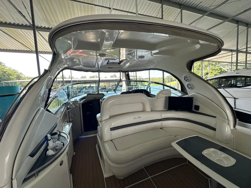 Slide: The Image of 2005 Sea Ray 420 Sundancer yacht interior with plush seating and modern amenities. - 22