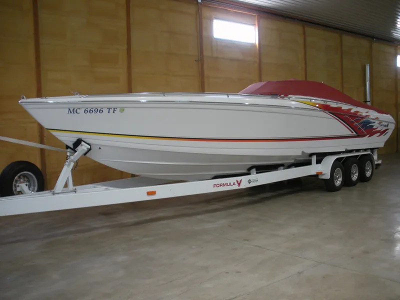 Slide: The Image of 2001 Fountain 35 Fastech speedboat on trailer in indoor storage. - 1