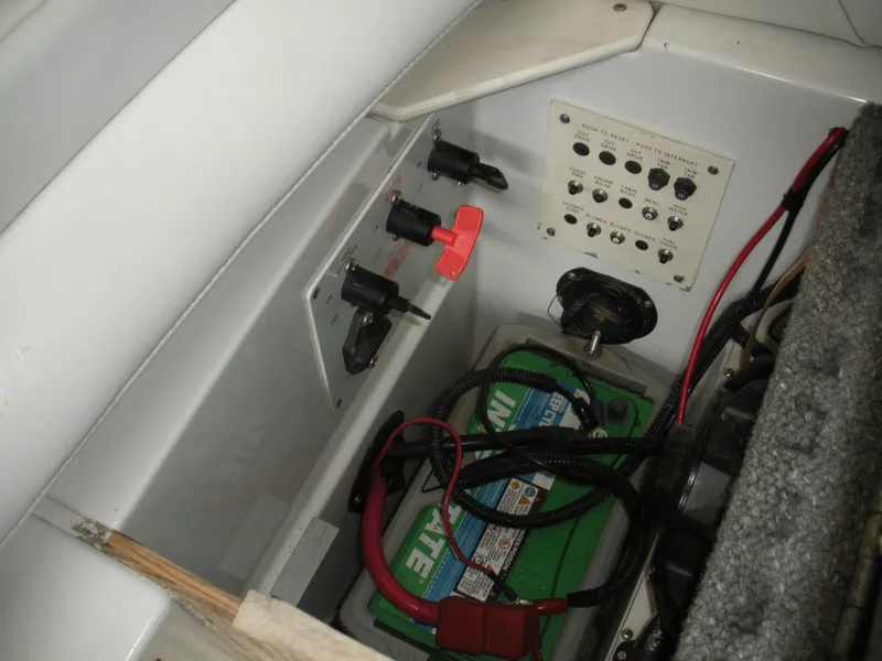 Slide: The Image of Electrical panel and battery compartment of a 2001 Fountain 35 Fastech boat. - 14