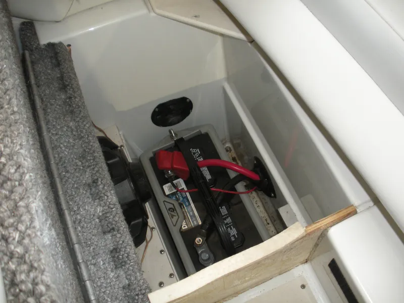Slide: The Image of Battery compartment of 2001 Fountain 35 Fastech boat with red and black cables. - 15