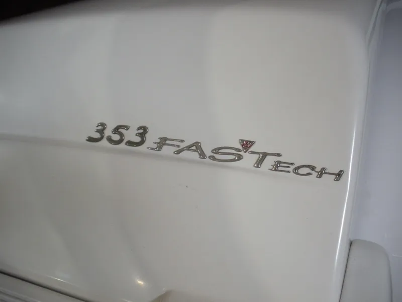 Slide: The Image of Close-up of 2001 Fountain 35 Fastech logo on white surface. - 2
