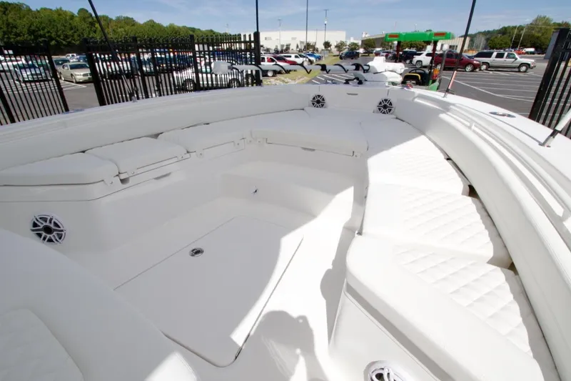 Slide: The Image of 2026 Regulator 26XO boat dashboard with modern navigation displays and controls. - 17