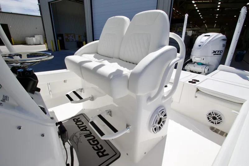 Slide: The Image of 2026 Regulator 26XO boat compartment showcasing internal plumbing and wiring systems. - 22